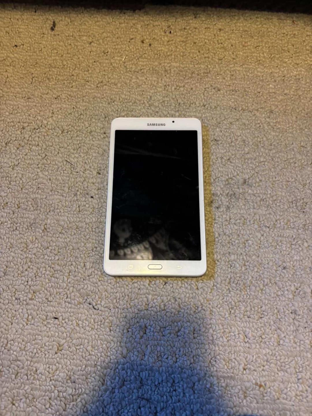 White Samsung Tablet and black, blackberry - photo 2