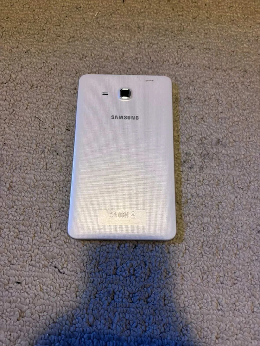 White Samsung Tablet and black, blackberry - photo 3