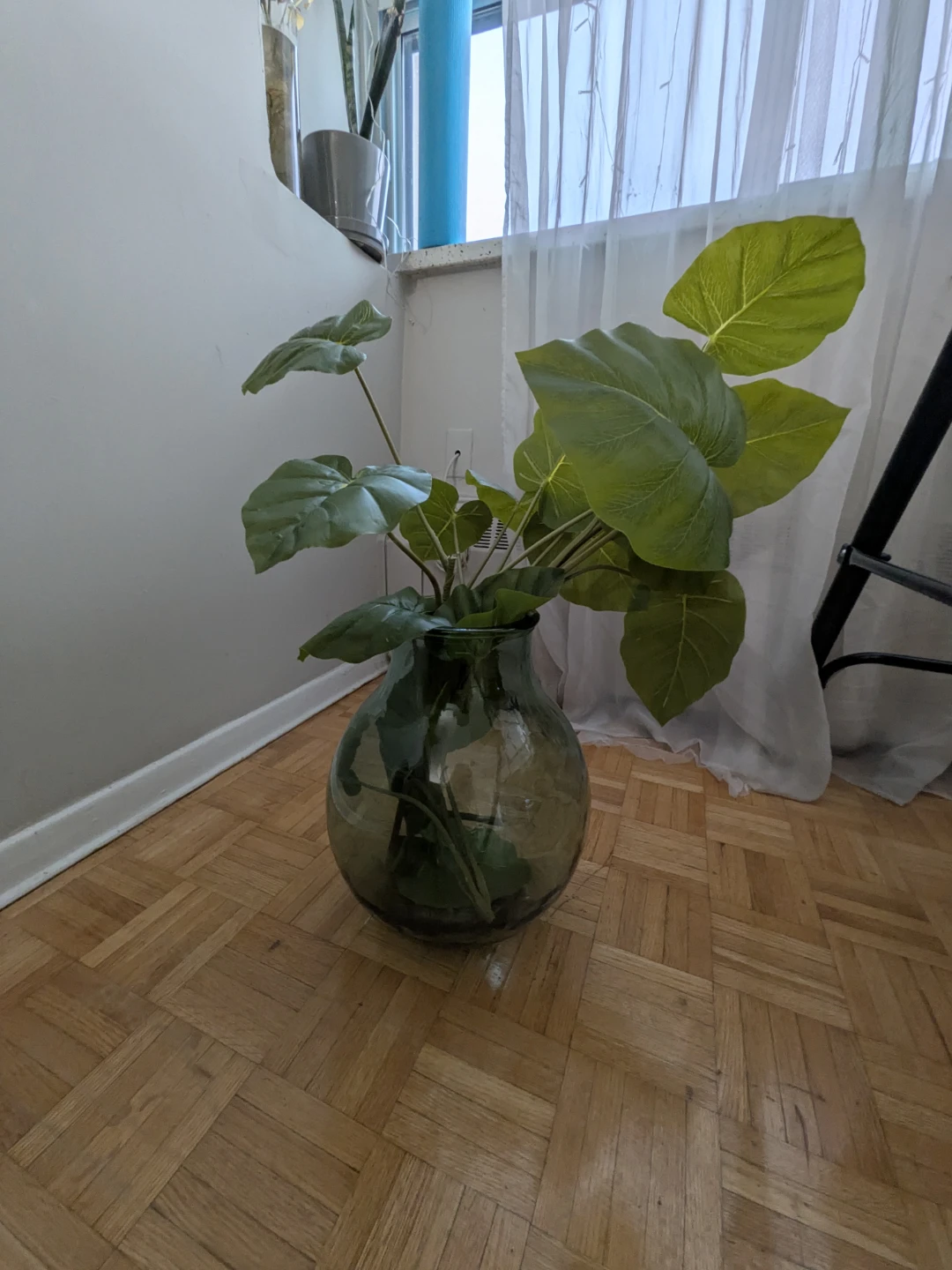 Artificial Plant in Large Glass Vase