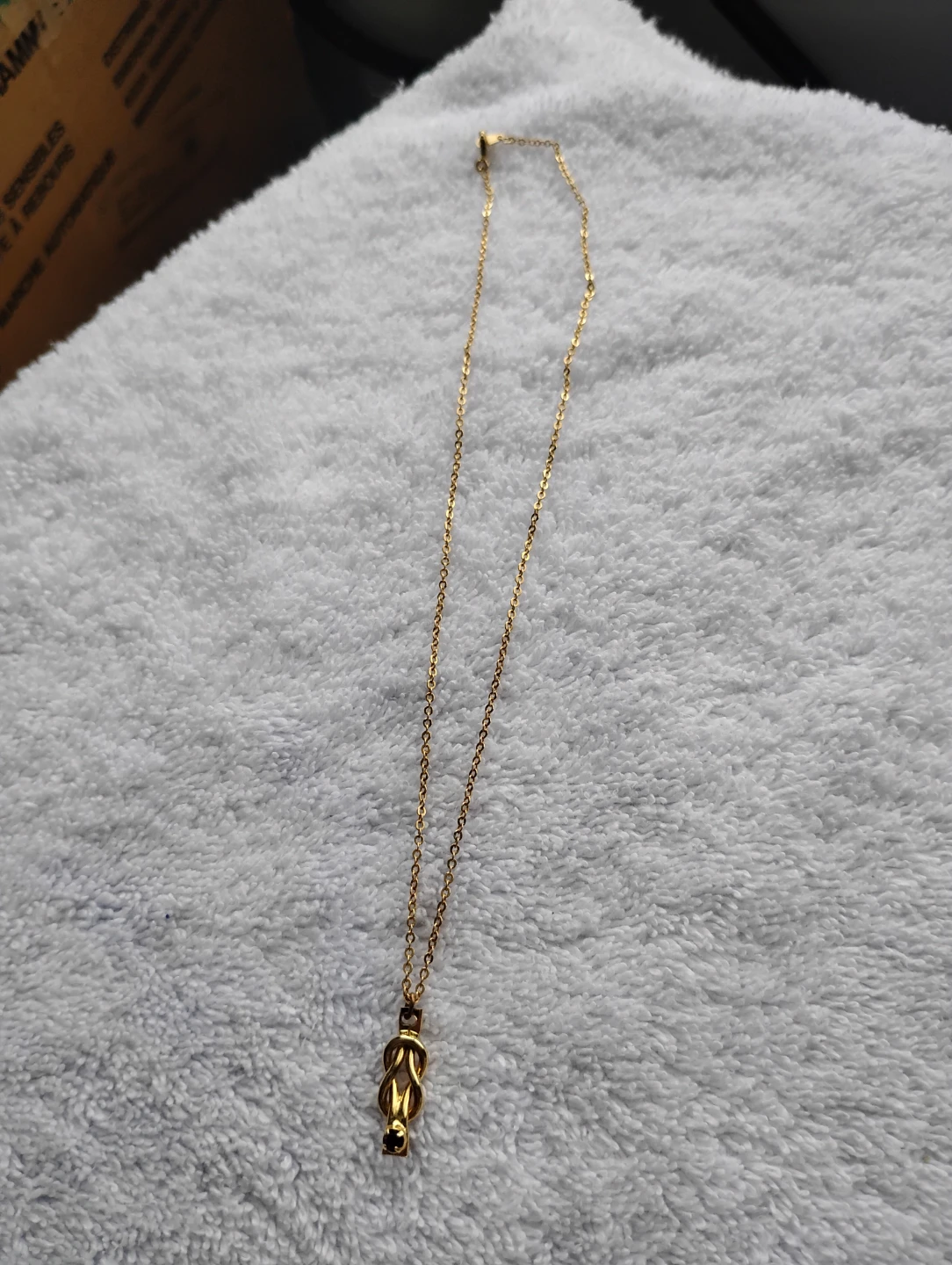 Gold-tone Knot Pendant Necklace