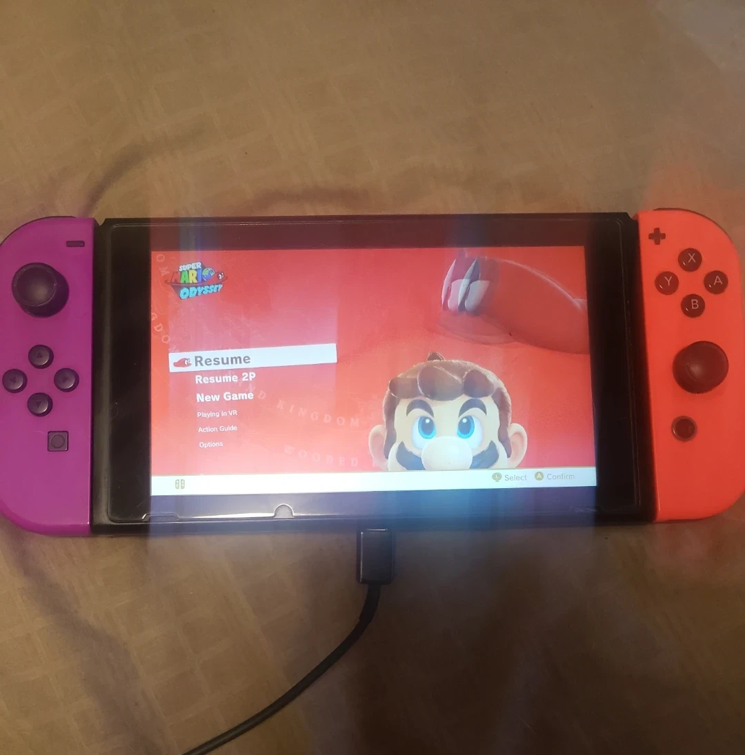 Nintendo Switch Console with Neon Pink and Orange Joy-Cons - photo 2