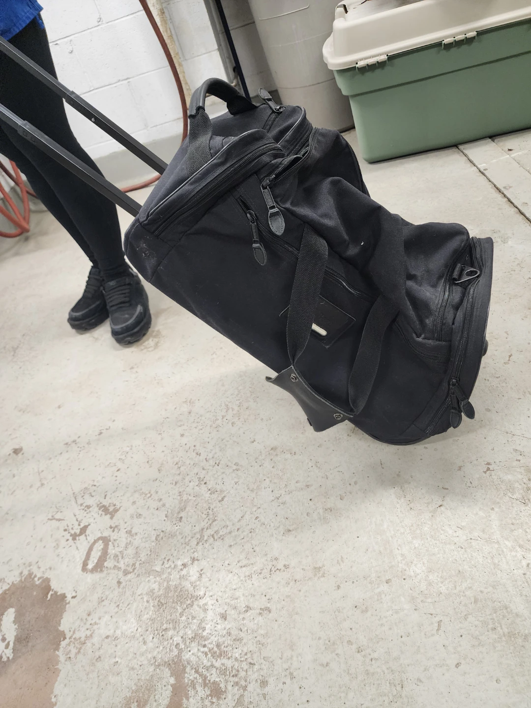 Black Rolling Duffel Bag with Telescoping Handle