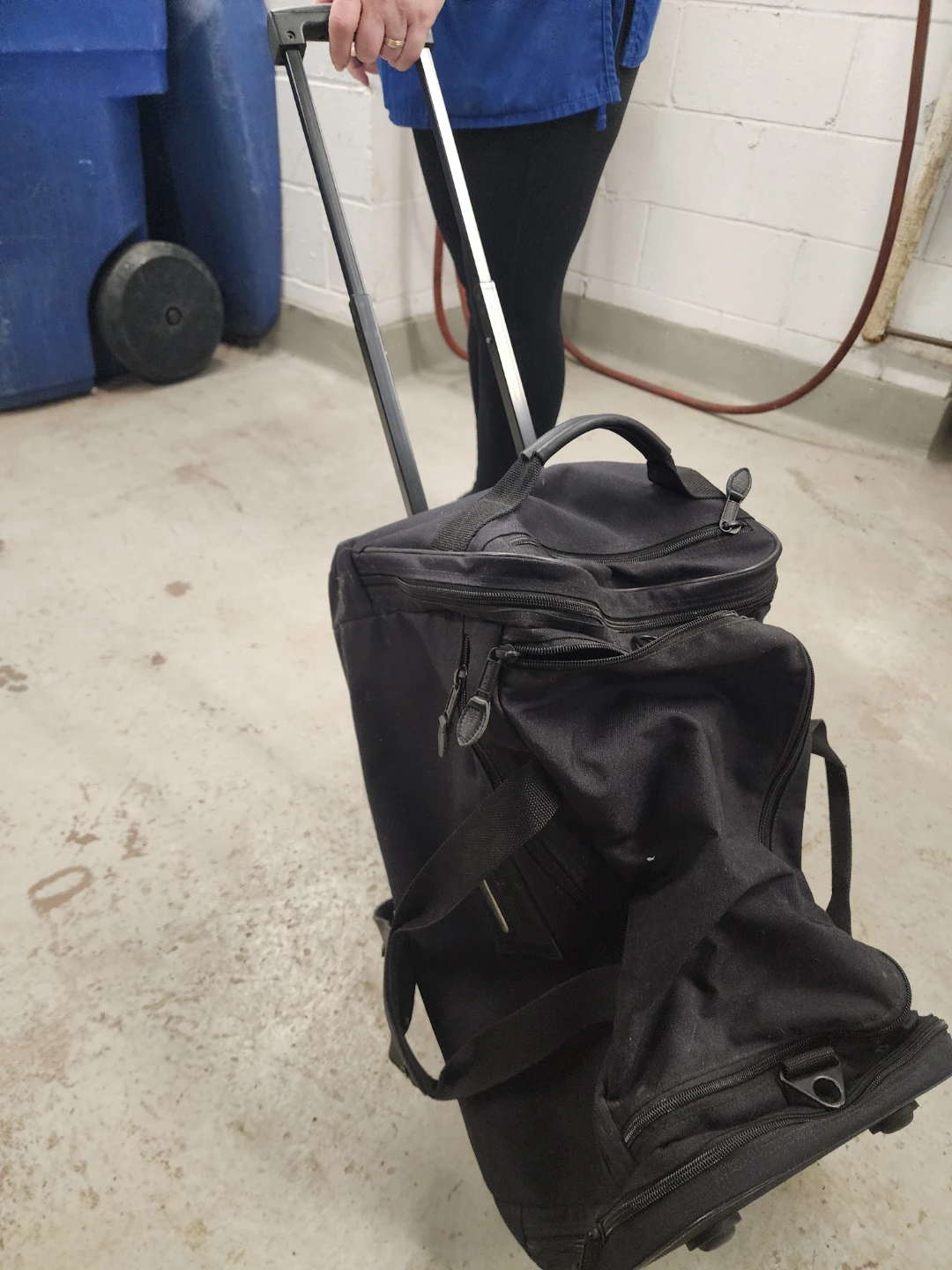 Black Rolling Duffel Bag with Telescoping Handle - photo 2
