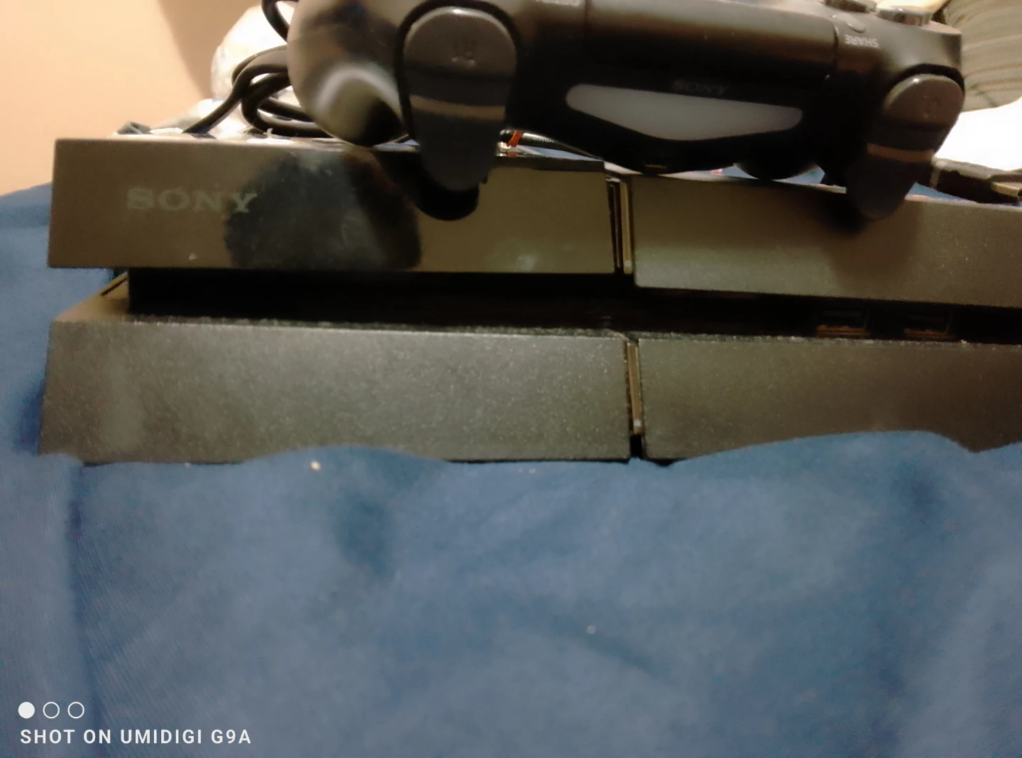 Sony PlayStation 4 (PS4) with Controller