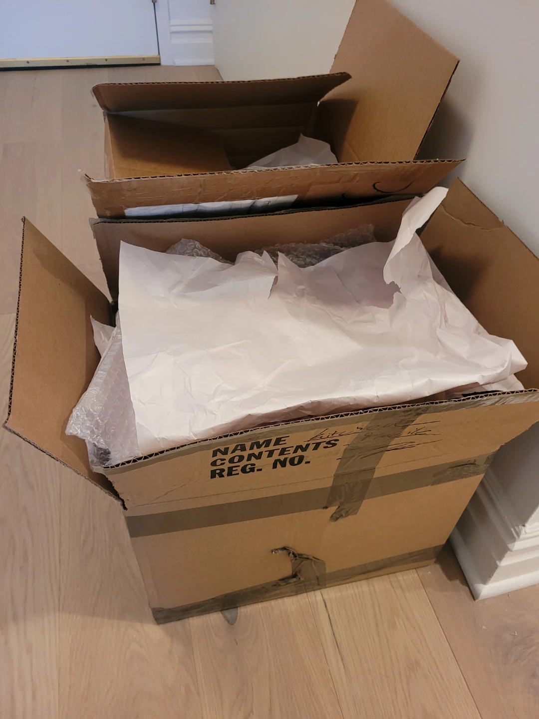 2 Free Cardboard Boxes for Moving with bubble wrap/packing paper