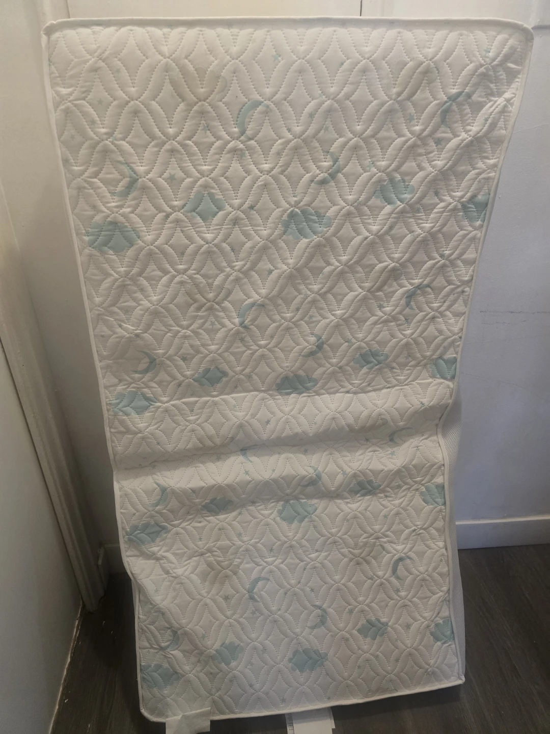 White Crib Mattress with Clouds and Stars Pattern