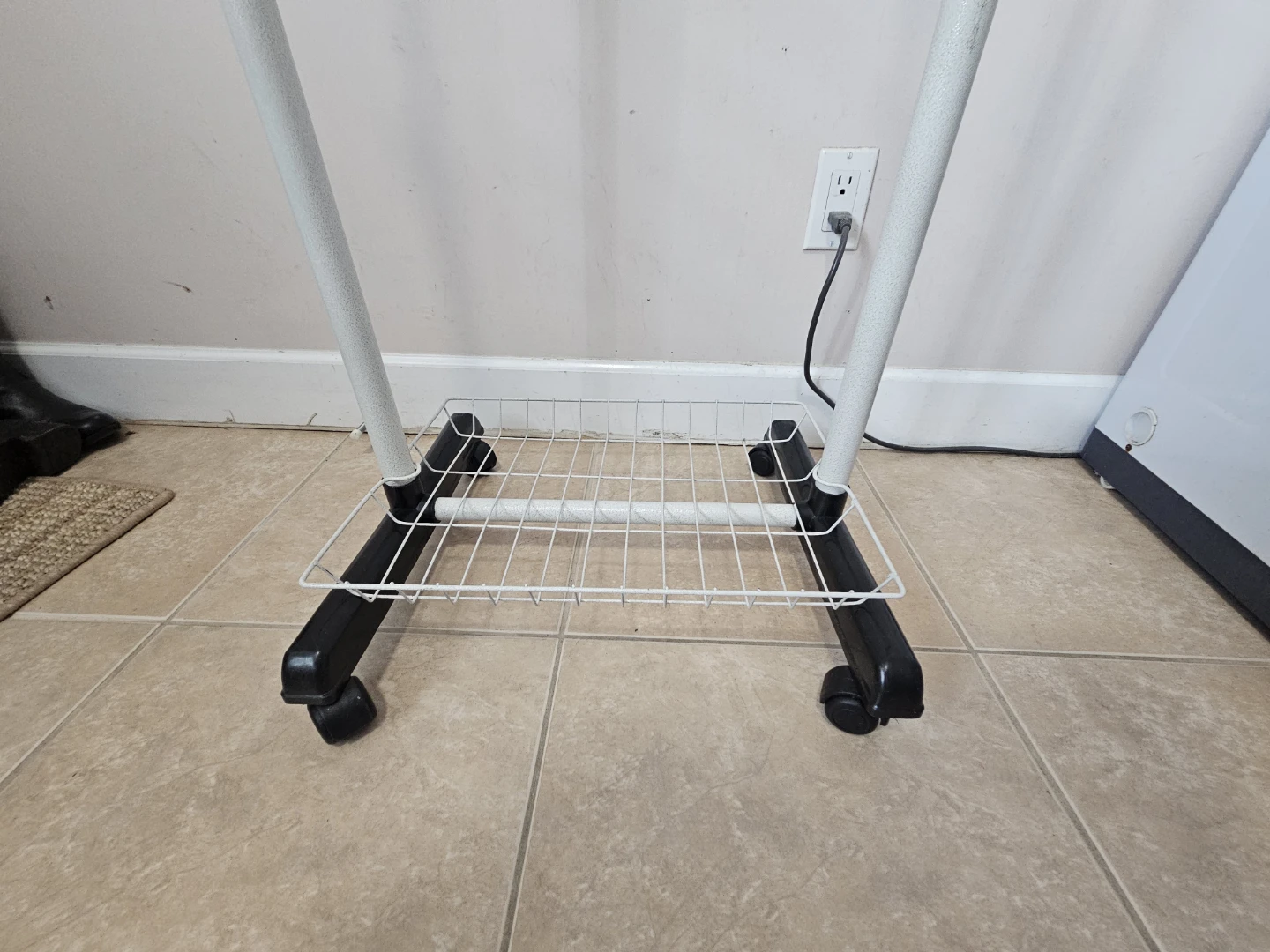 Rolling clothes rack with bottom shelf - photo 3