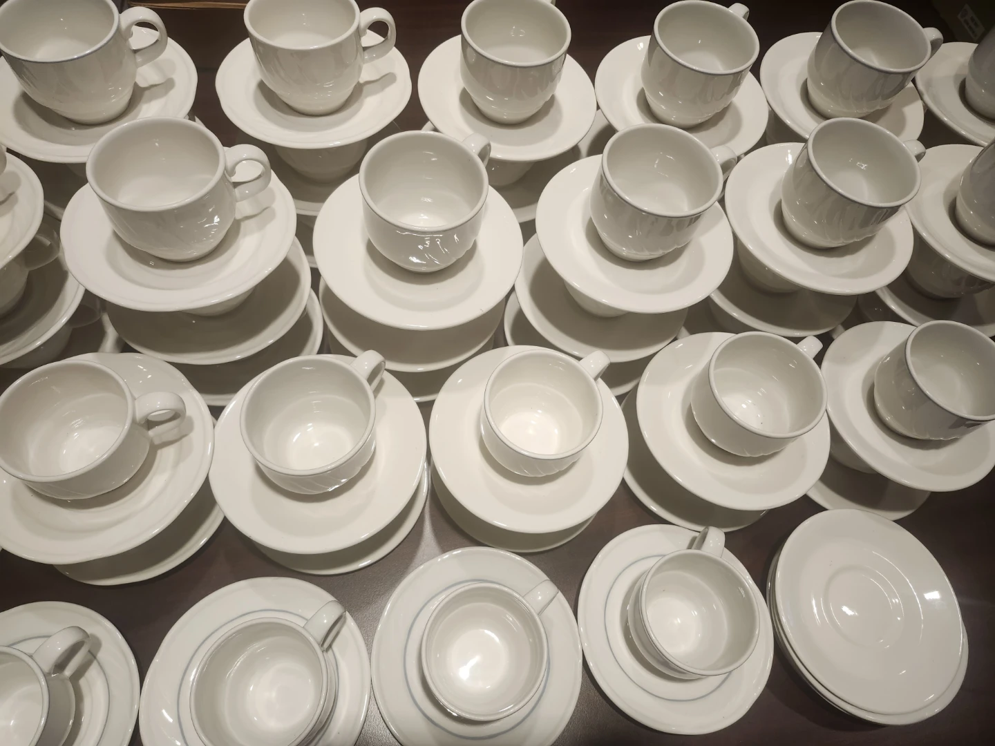 Set of 70 White Ceramic Coffee Cups and Saucers