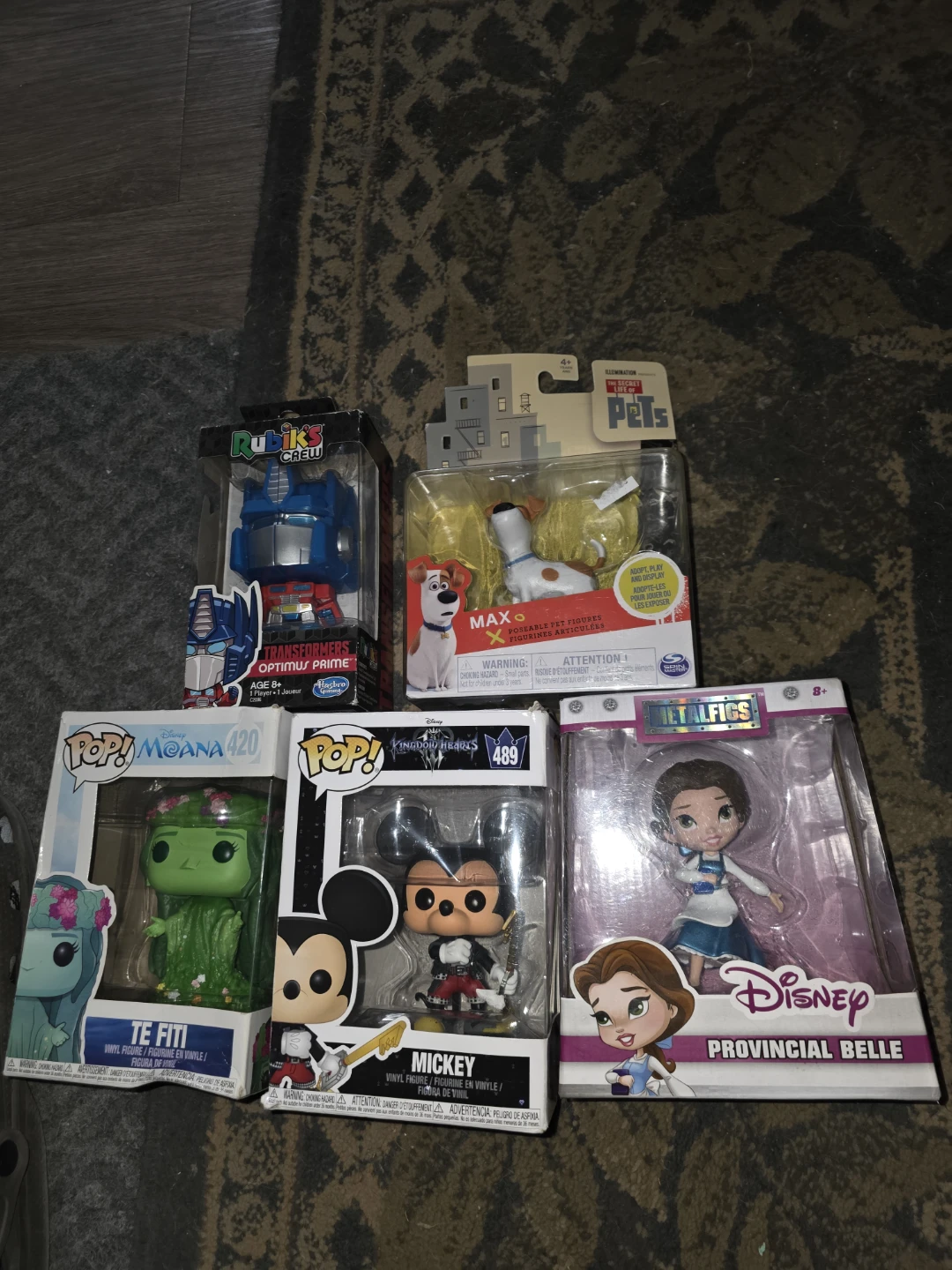 Collection of Funko Pop! figures and other toys