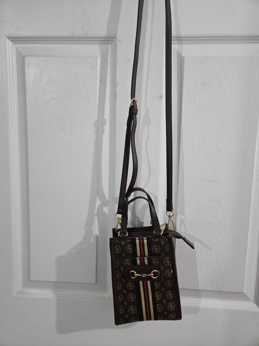 Brown monogram crossbody bag with gold hardware