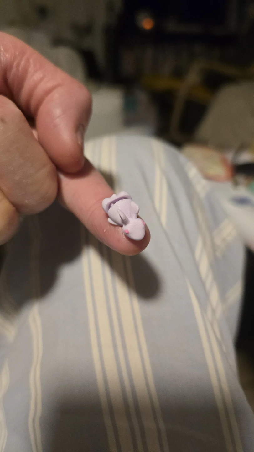 Tiny Purple Animal Figurine