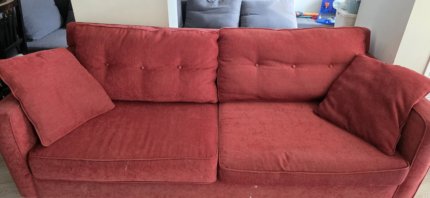 Red Sofa with Accent Pillows