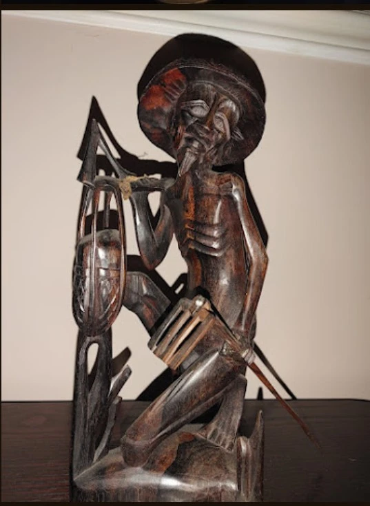 Hand-Carved Indonesian Wooden Figurine