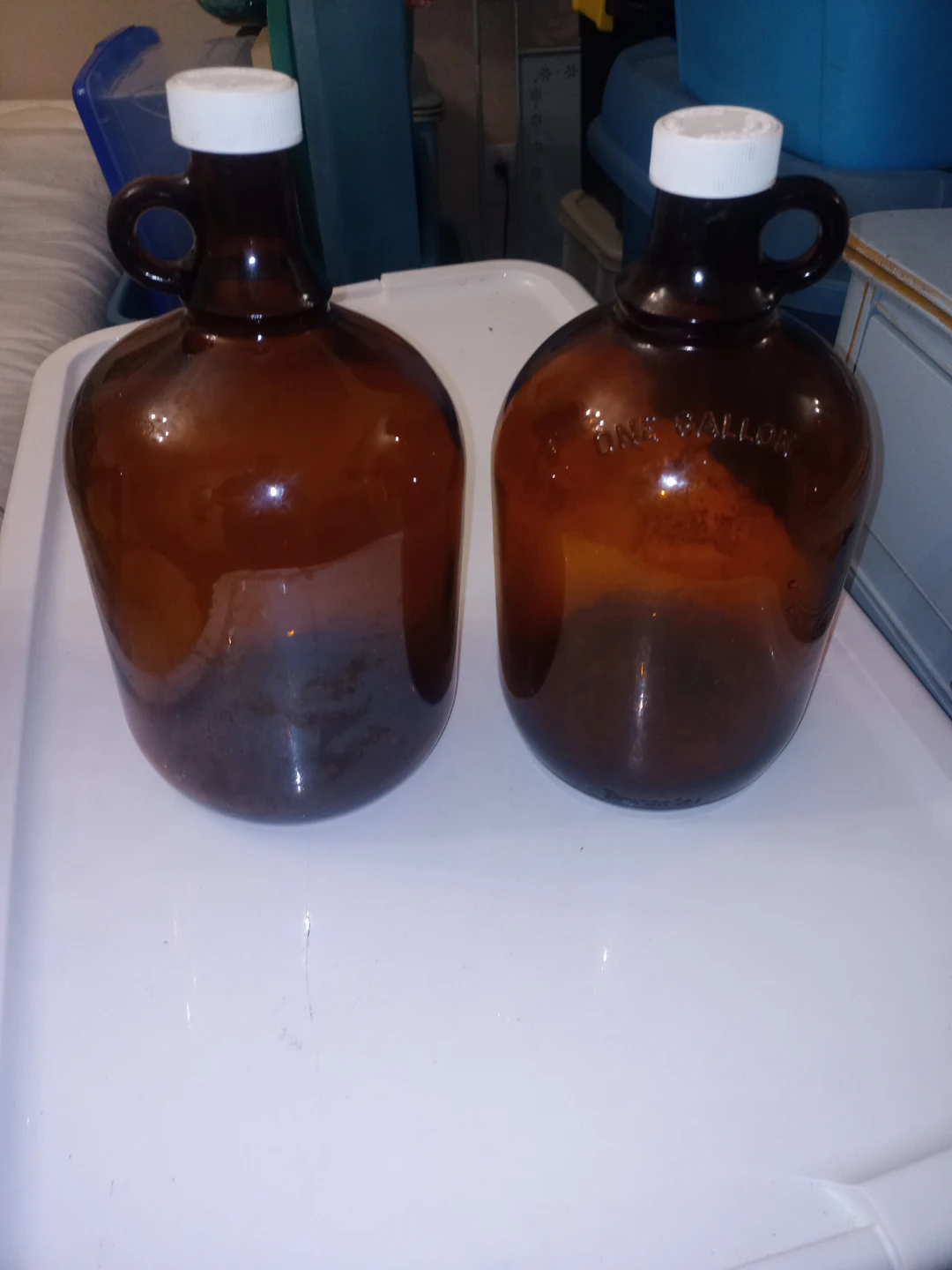 2 Brown Glass Jugs