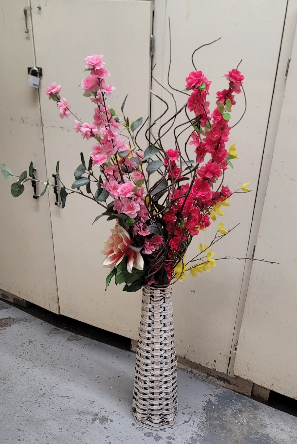 Decorative Floral Arrangement with Woven Vase