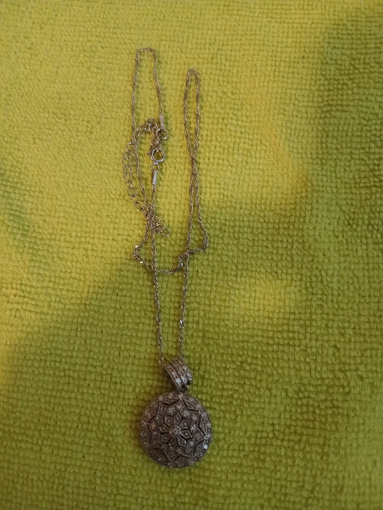 Silver Locket Necklace with Intricate Design