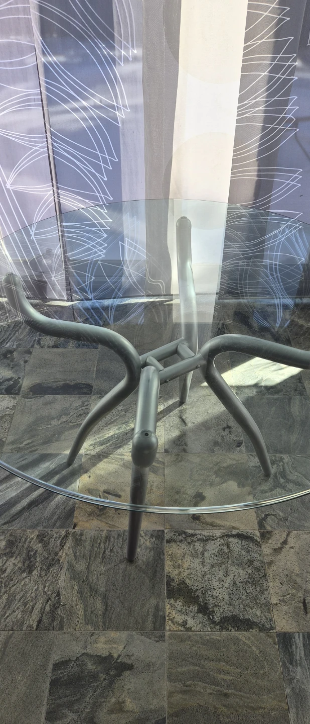 Glass top dining table with unique metal base - photo 3