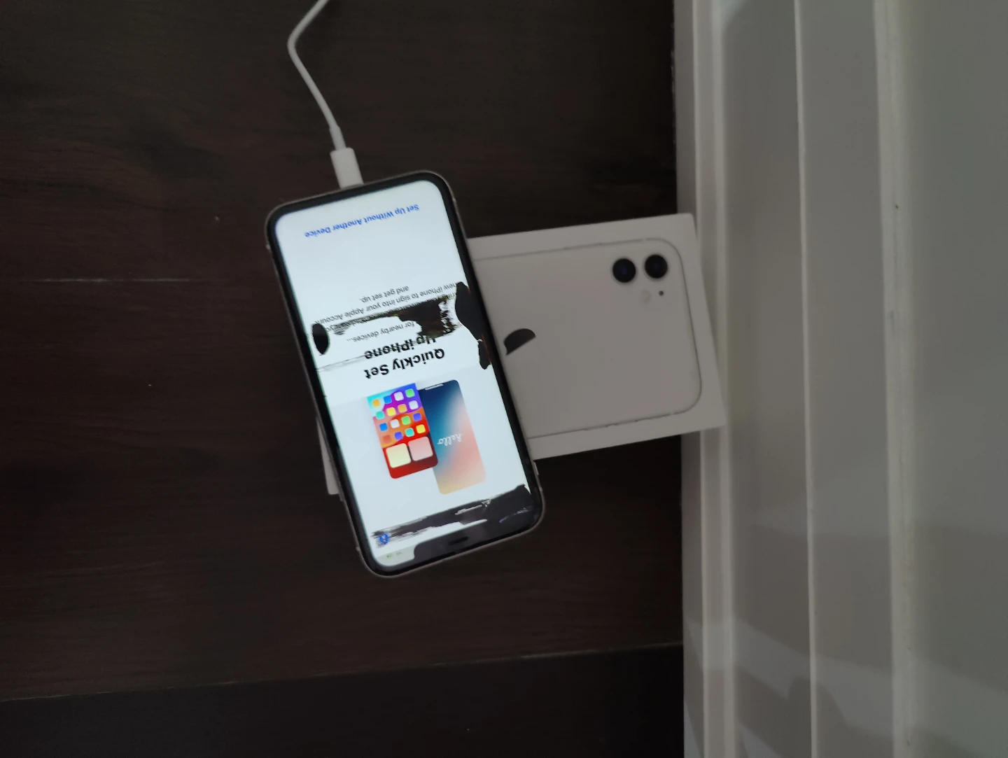 Apple iPhone 11 - White with a broken screen