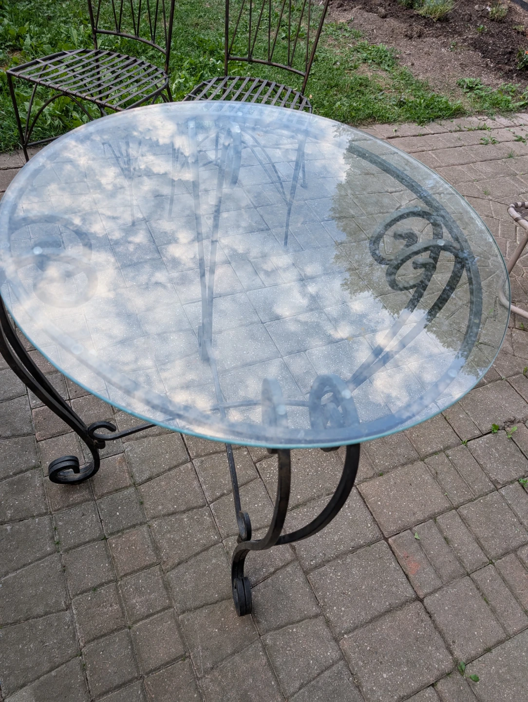 Metal patio table and chairs set. 30 ins all around 29ins Depth