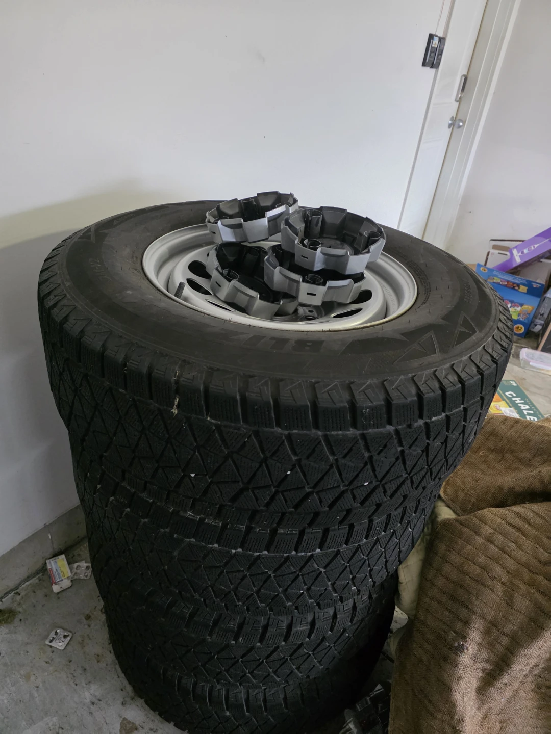 Set of 4 Winter Tires and 4 Hubcaps