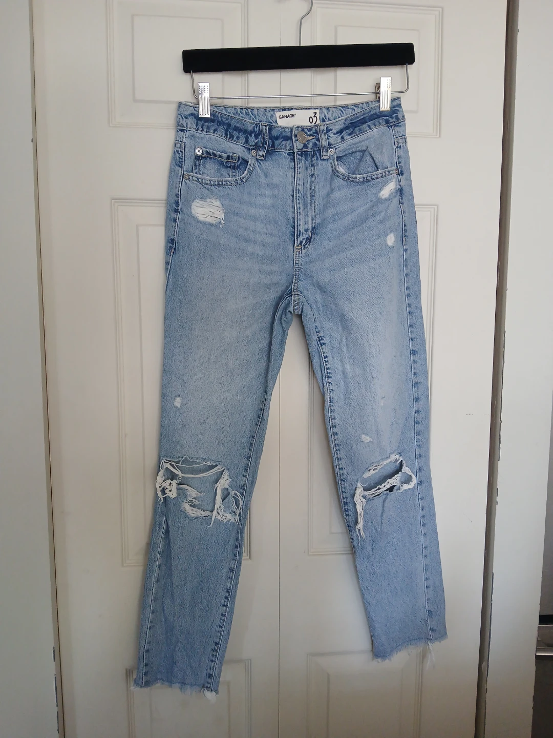 Garage distressed light jeans, size 4