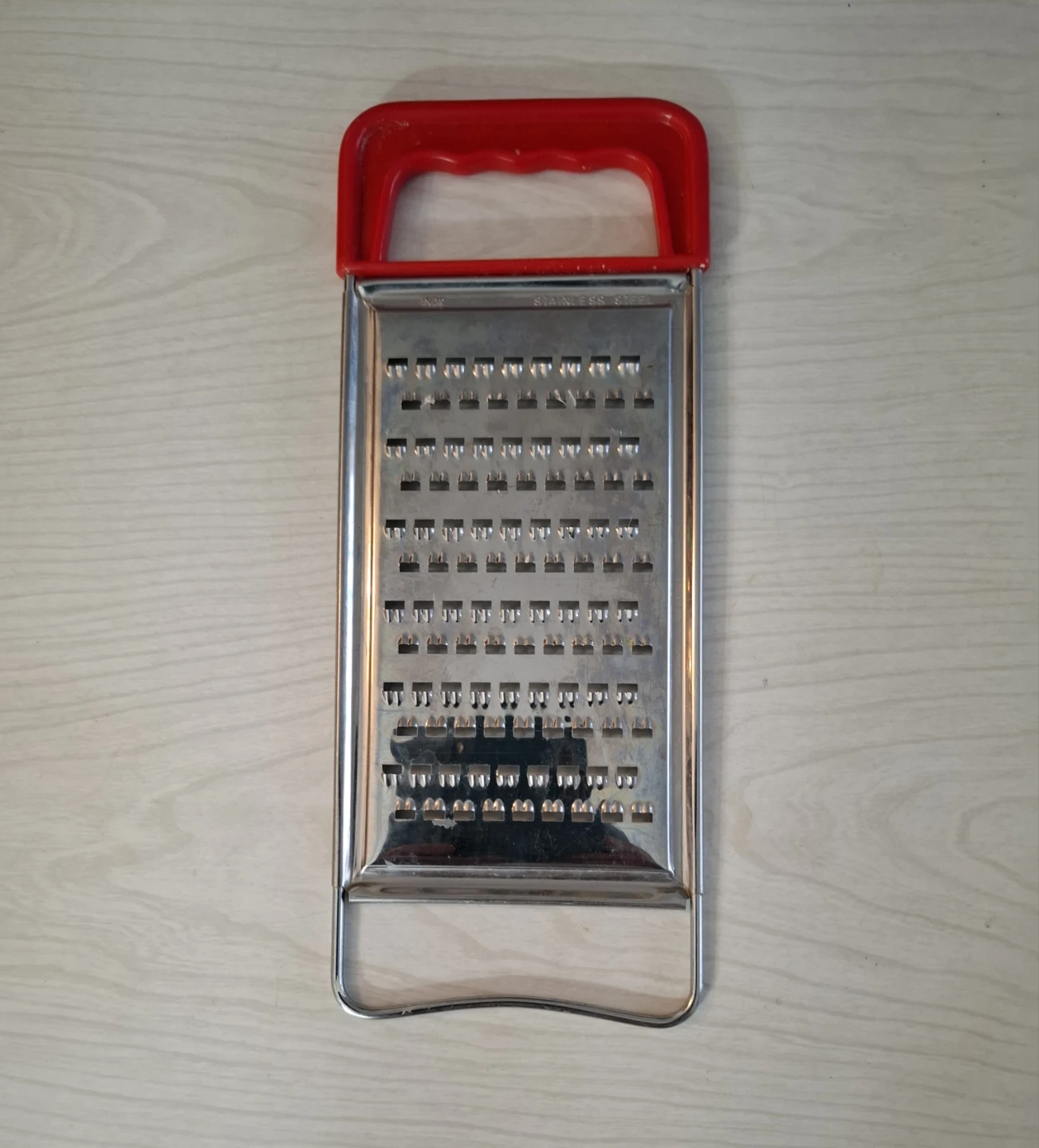 Stainless Steel Grater with Red Handle
