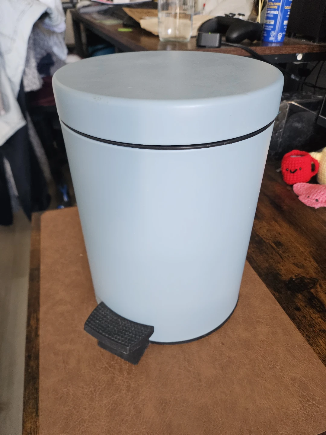 Small soft close trash bin in pale blue