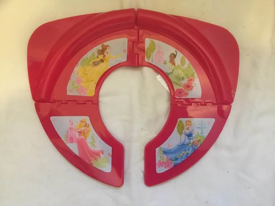 Folding potty seat