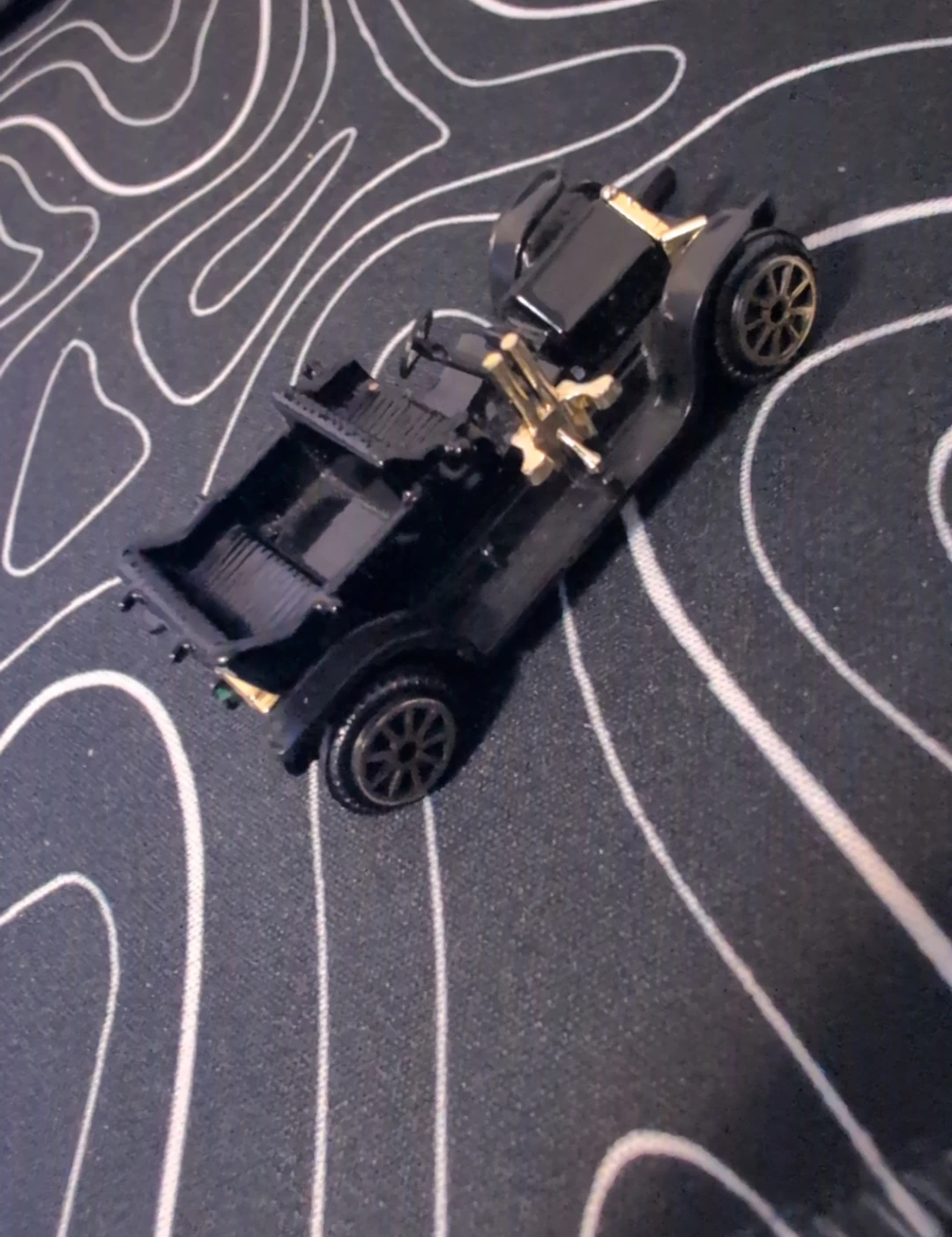 Black toy car chassis