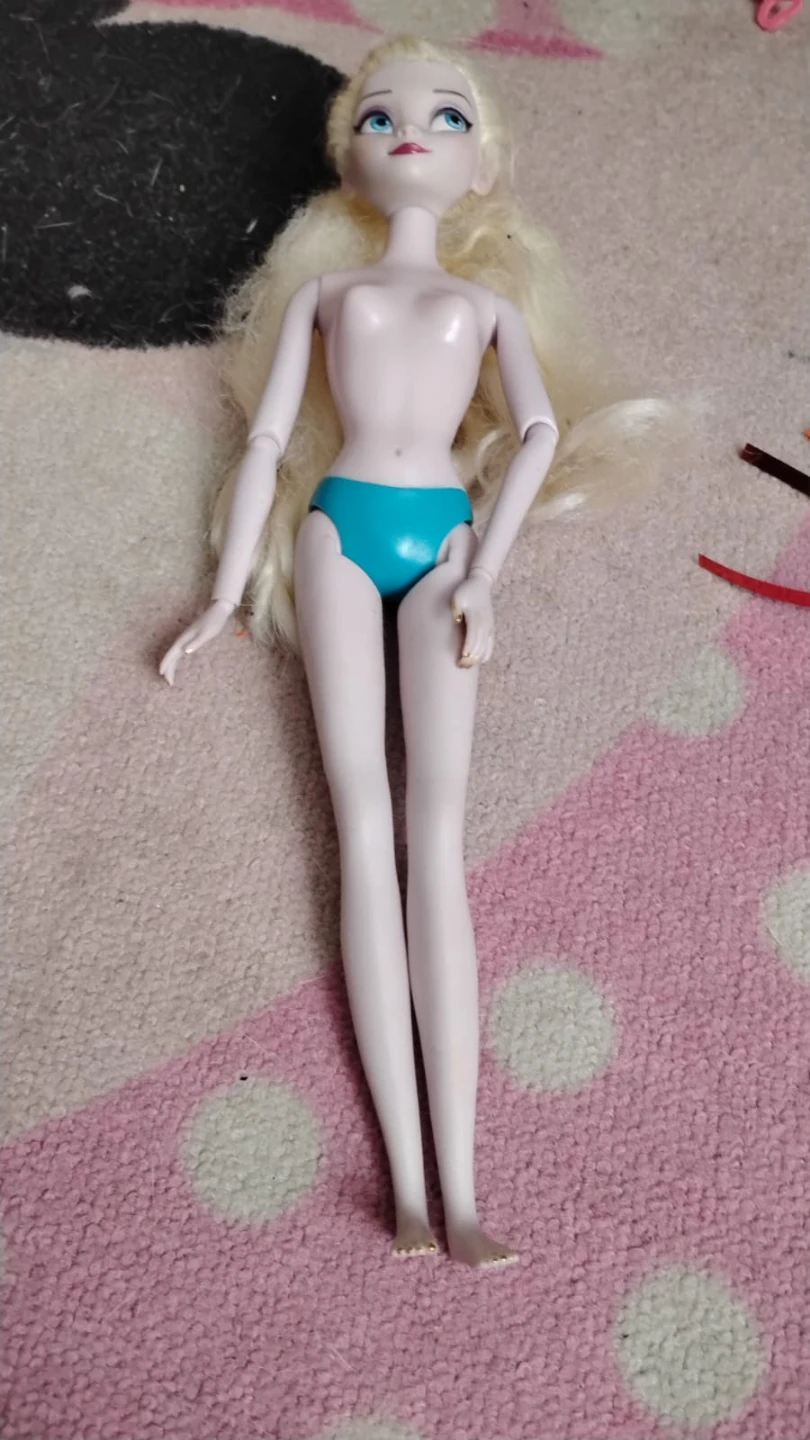 Rainbow High and Elsa dolls