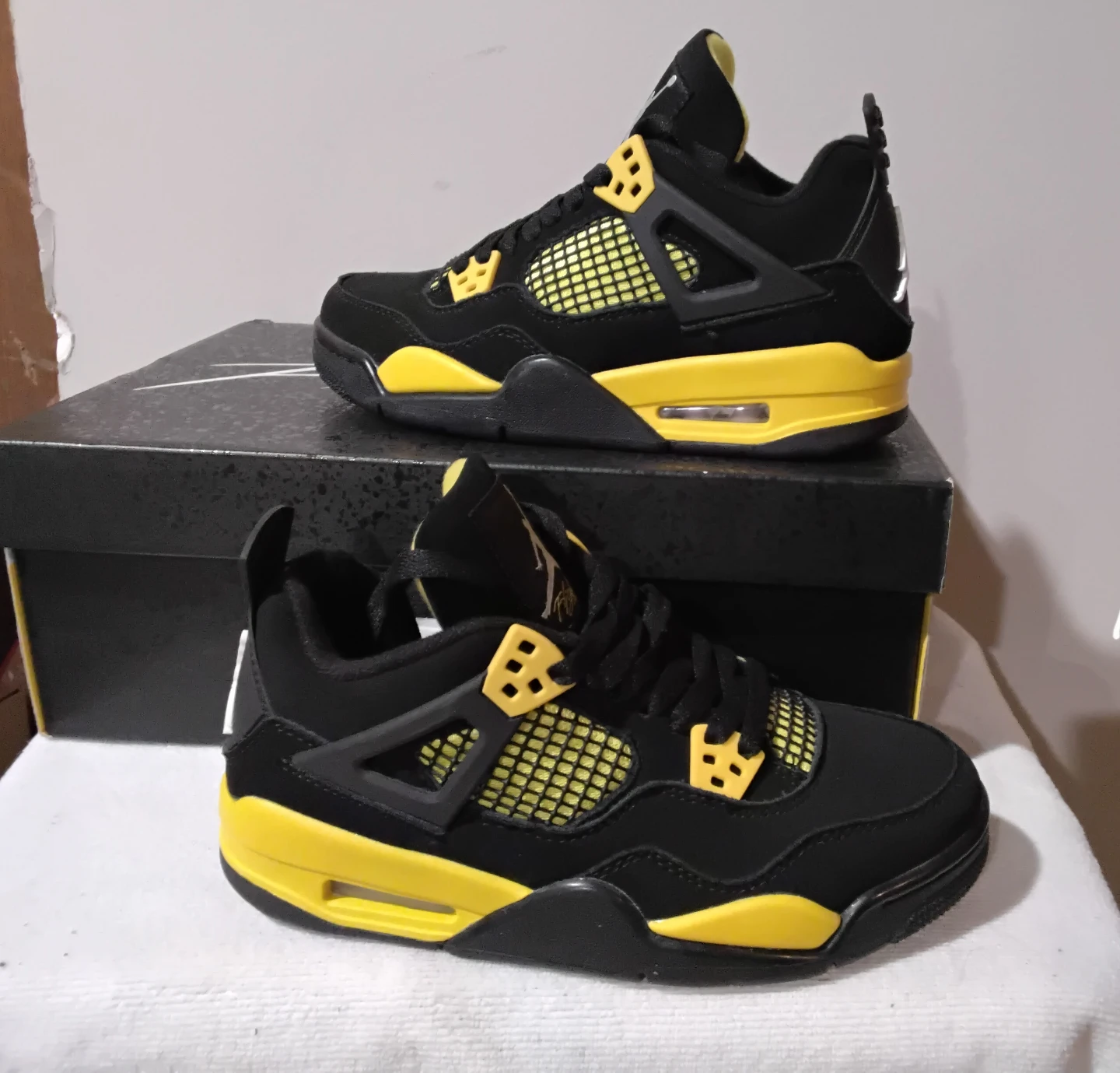 Air Jordan 4 Retro Black Yellow Sneakers