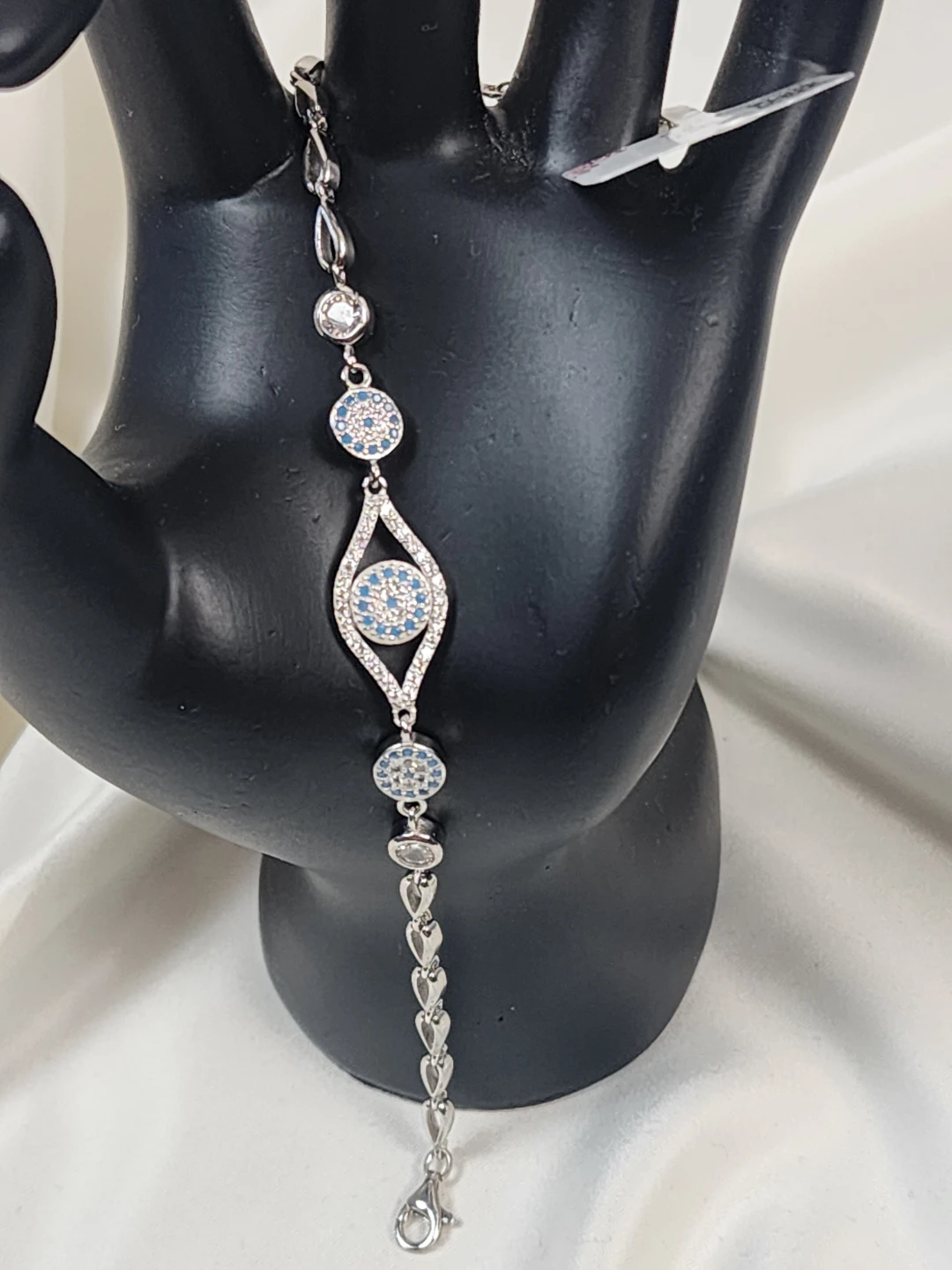 Sparkling Eye Design Bracelet with Blue & White Stones