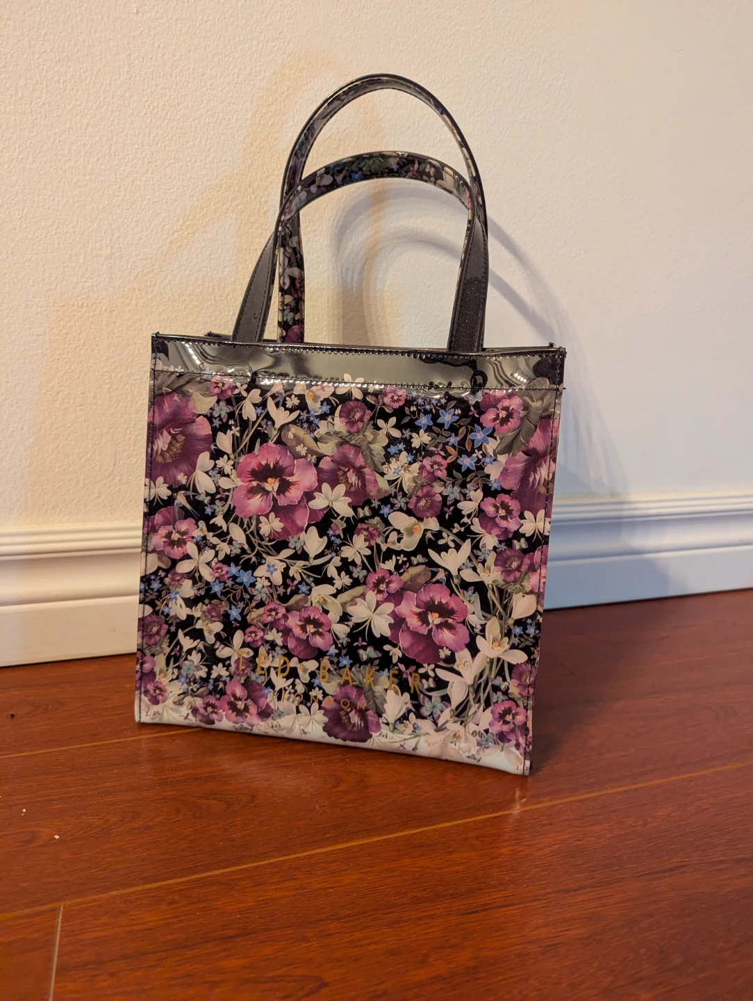 A floral-pattern tote bag from Ted Baker