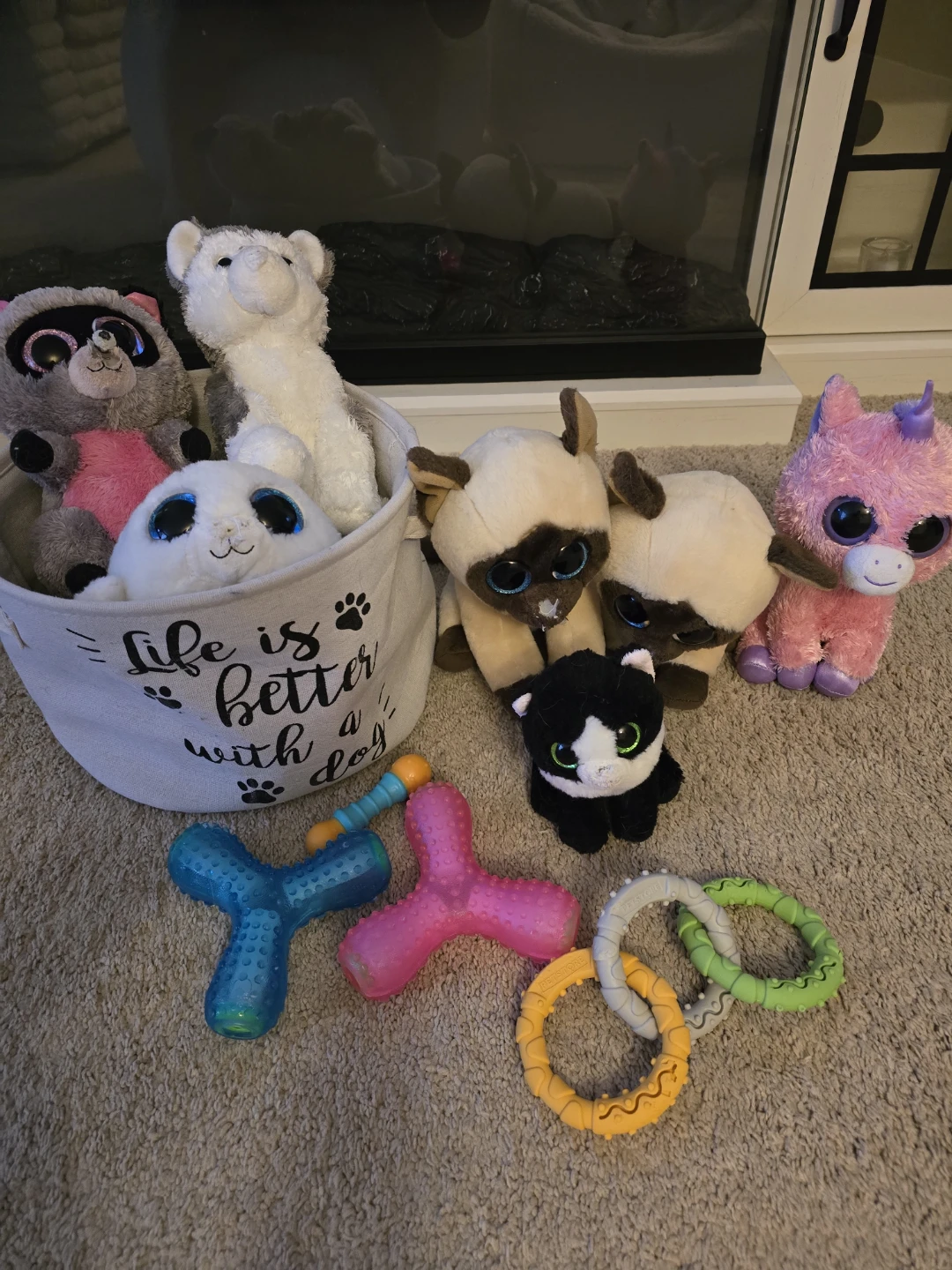 Collection of 6 plush toys and 4 dog toys