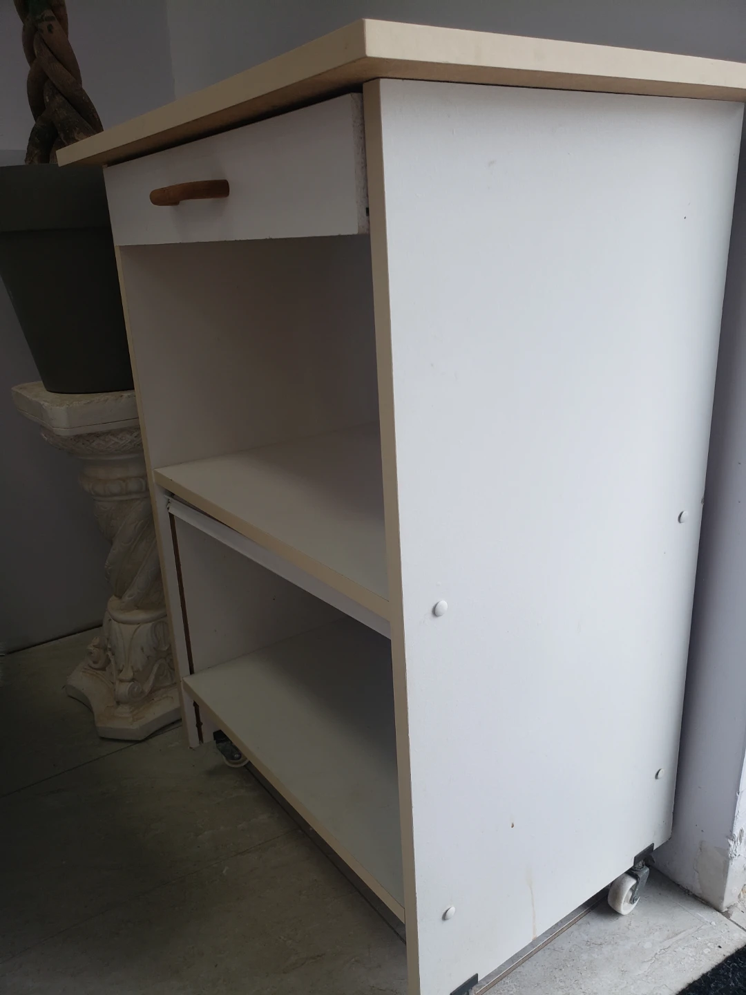 White rolling storage cabinet with drawer
