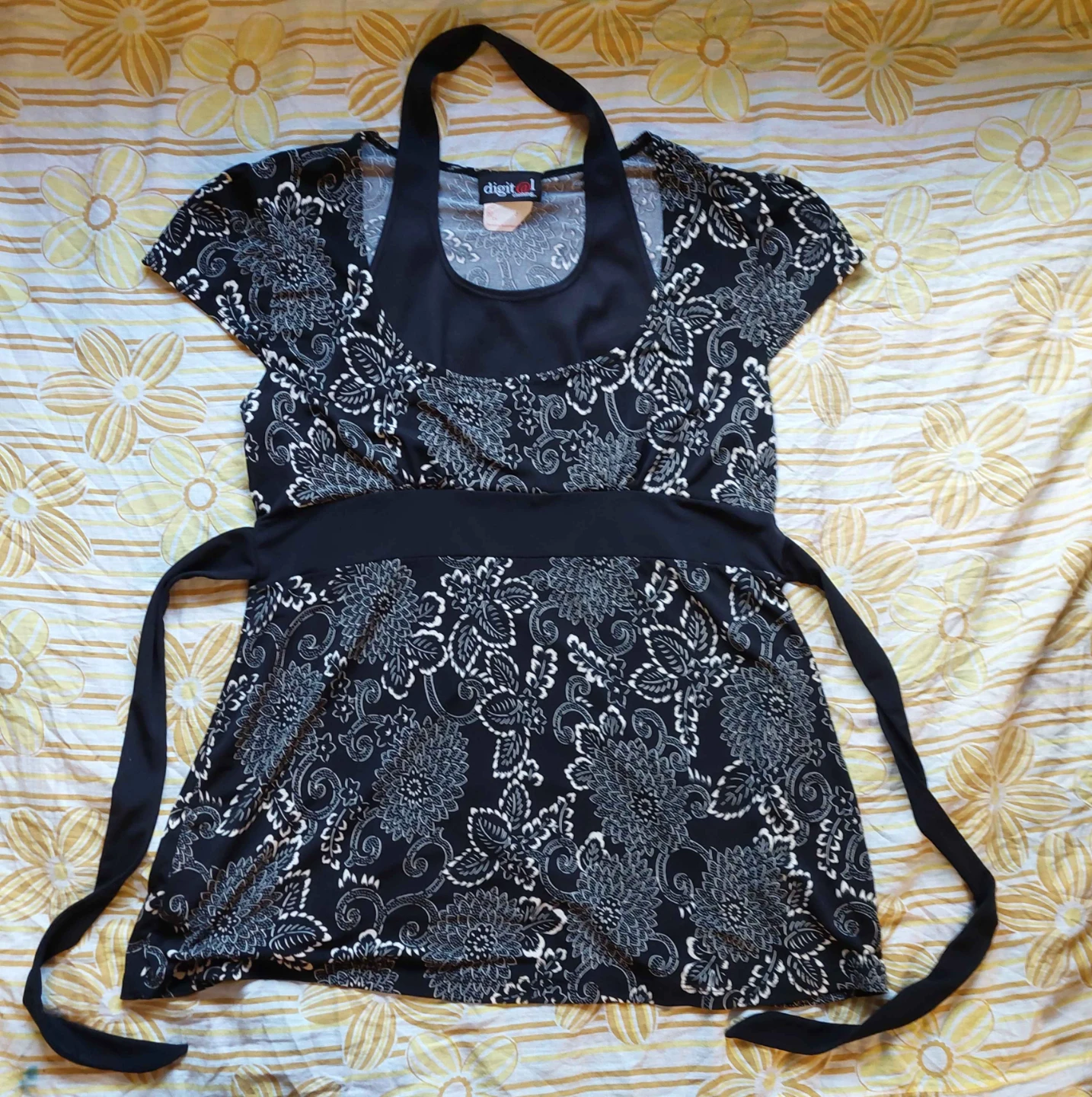 Black and white floral babydoll top with tie back