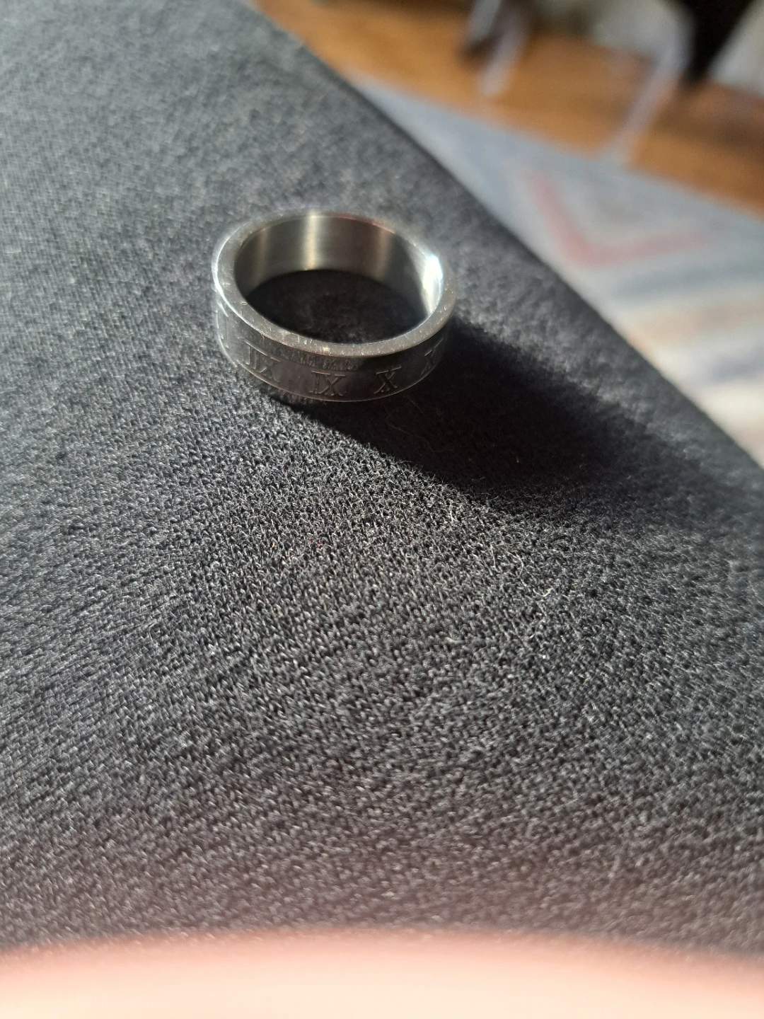 Silver band ring with Roman numerals