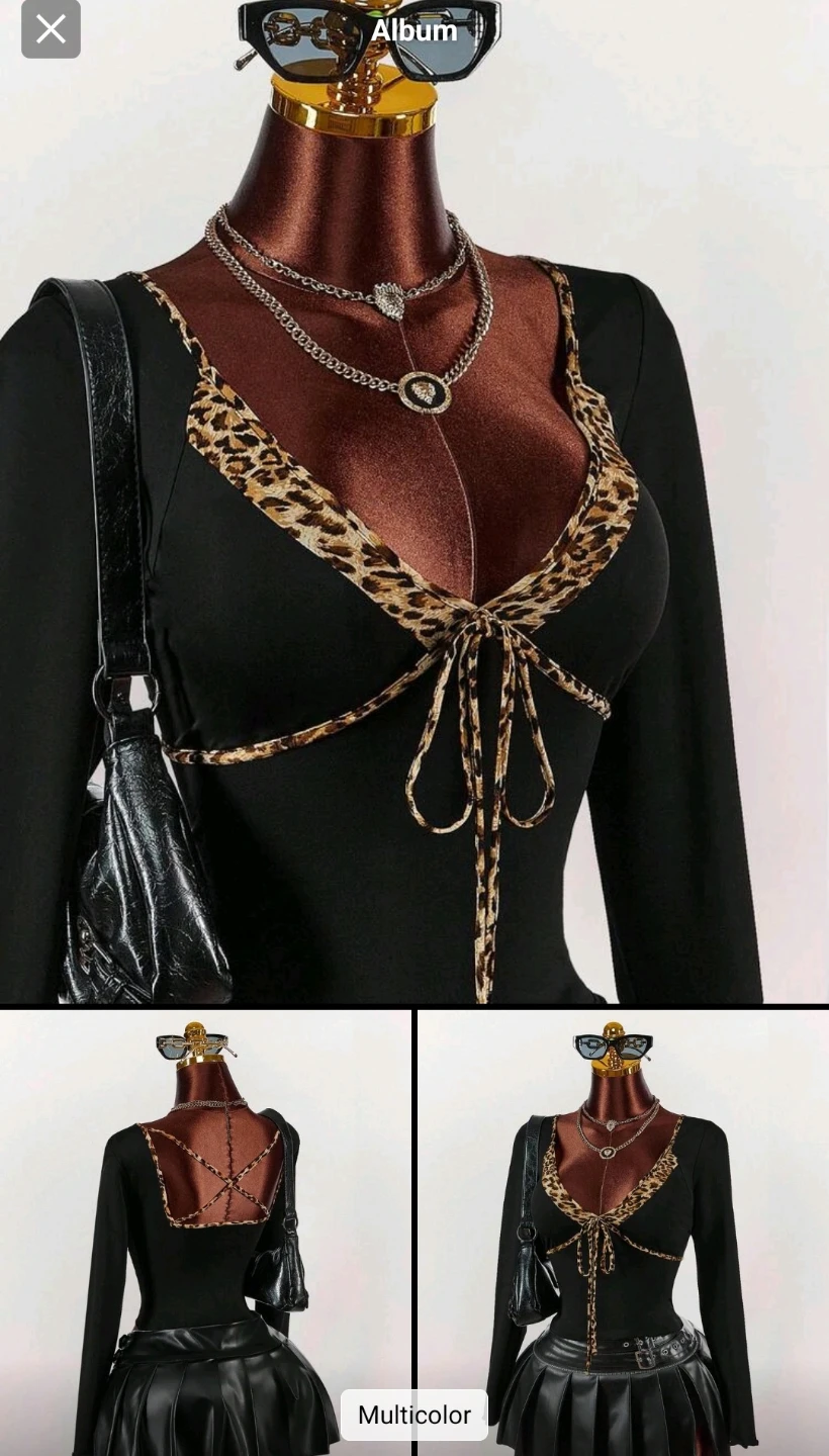 Black long-sleeve top with leopard print trim
