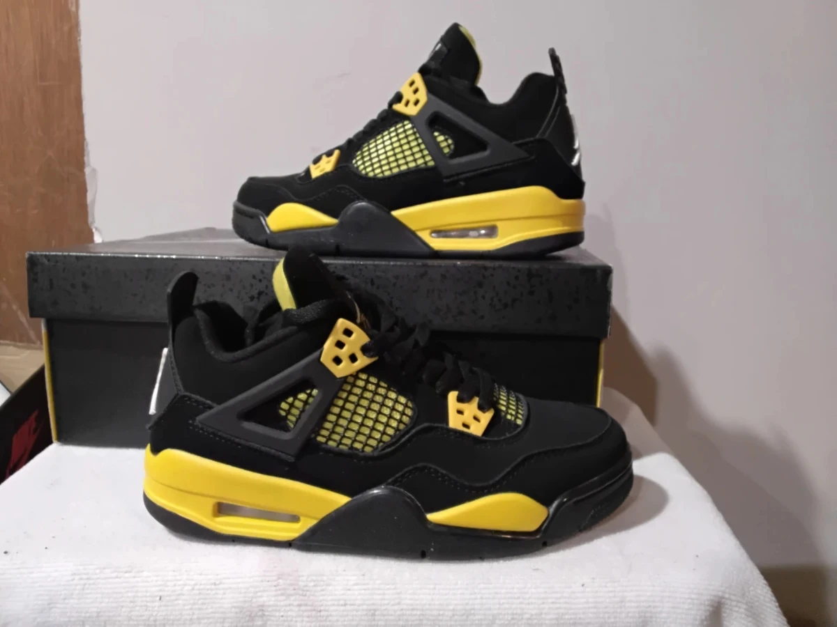 Air Jordan 4 Retro Black Yellow Sneakers - photo 2