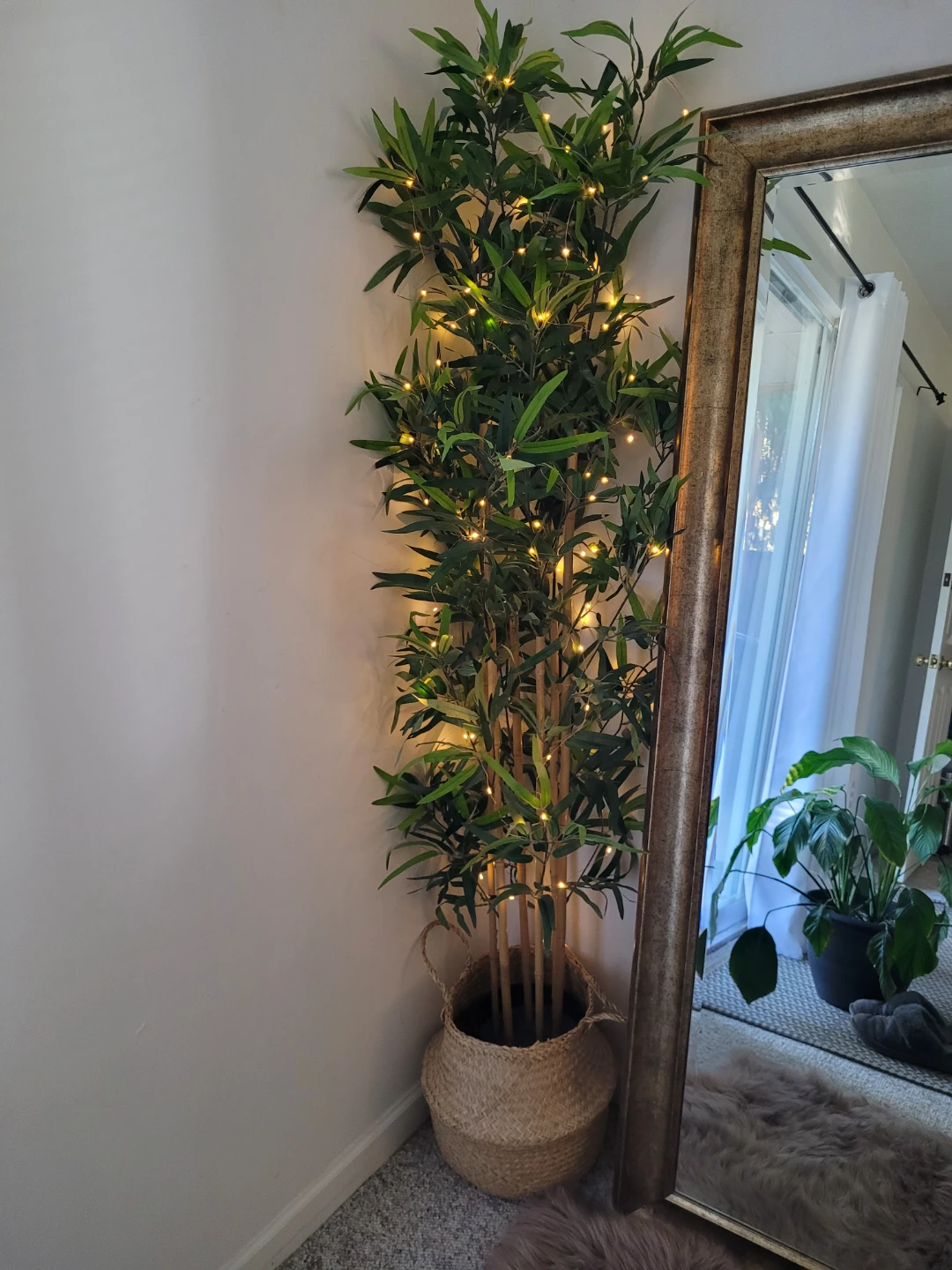 IKEA Artificial Bamboo Plant with copper fairy lights