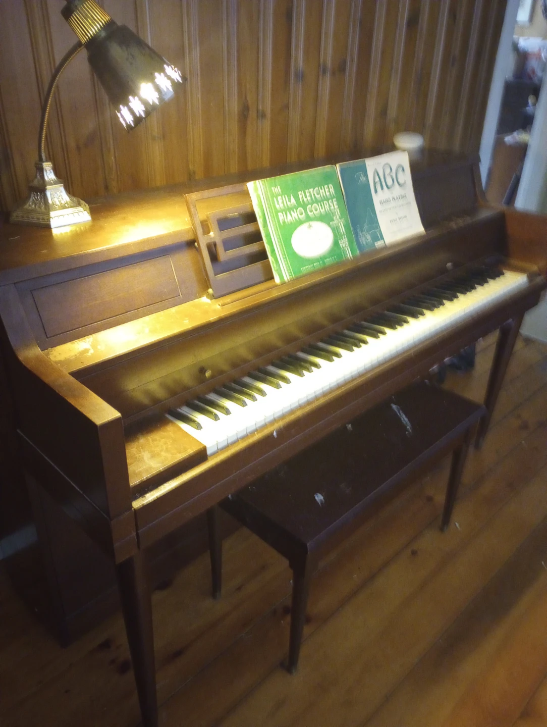 Wooden Piano with Bench and Music Books