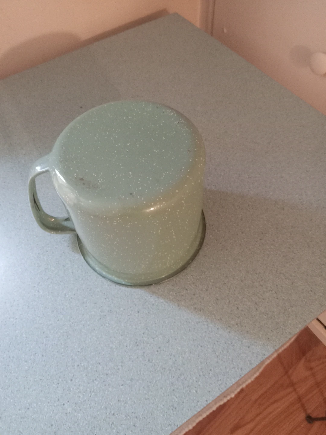 A small metal.pot with a handle - photo 3
