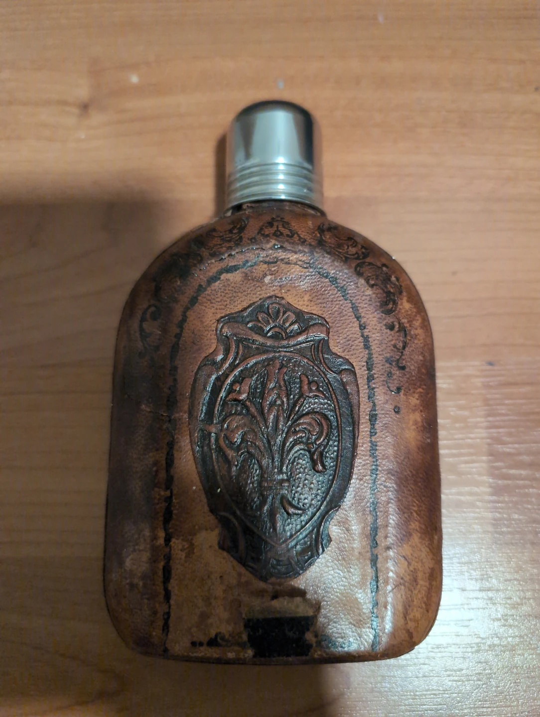 Old fashioned scouts cognac liquor bottle