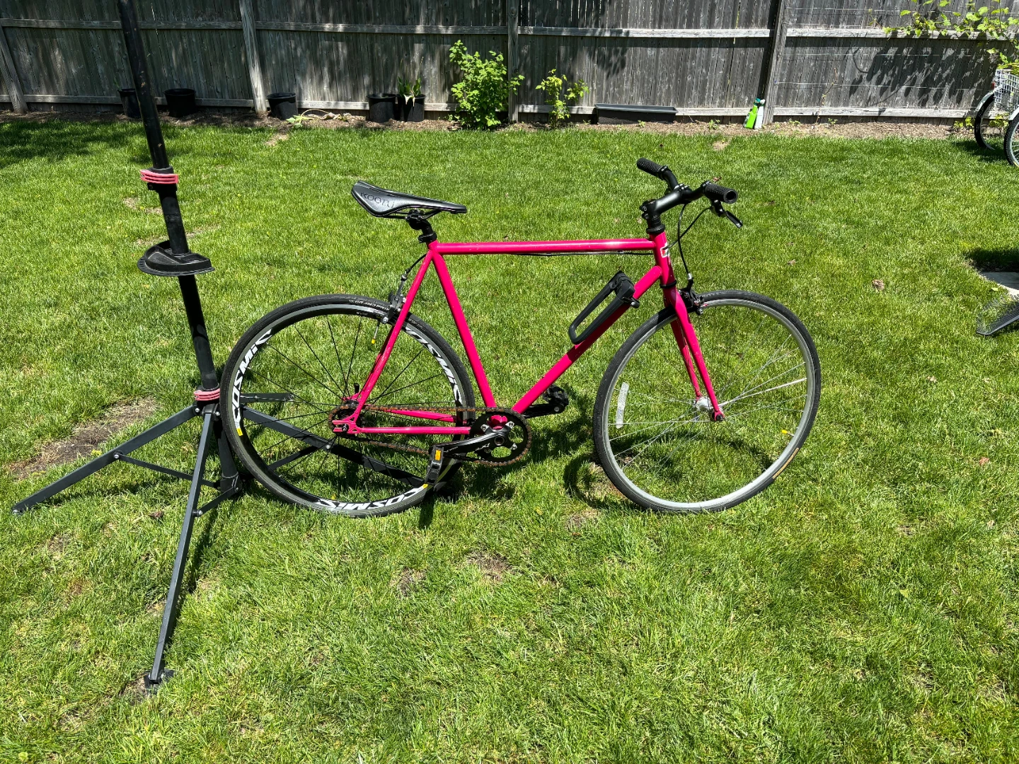 Custom Single Speed Steel Frame Track Bike, helmet, and tools.