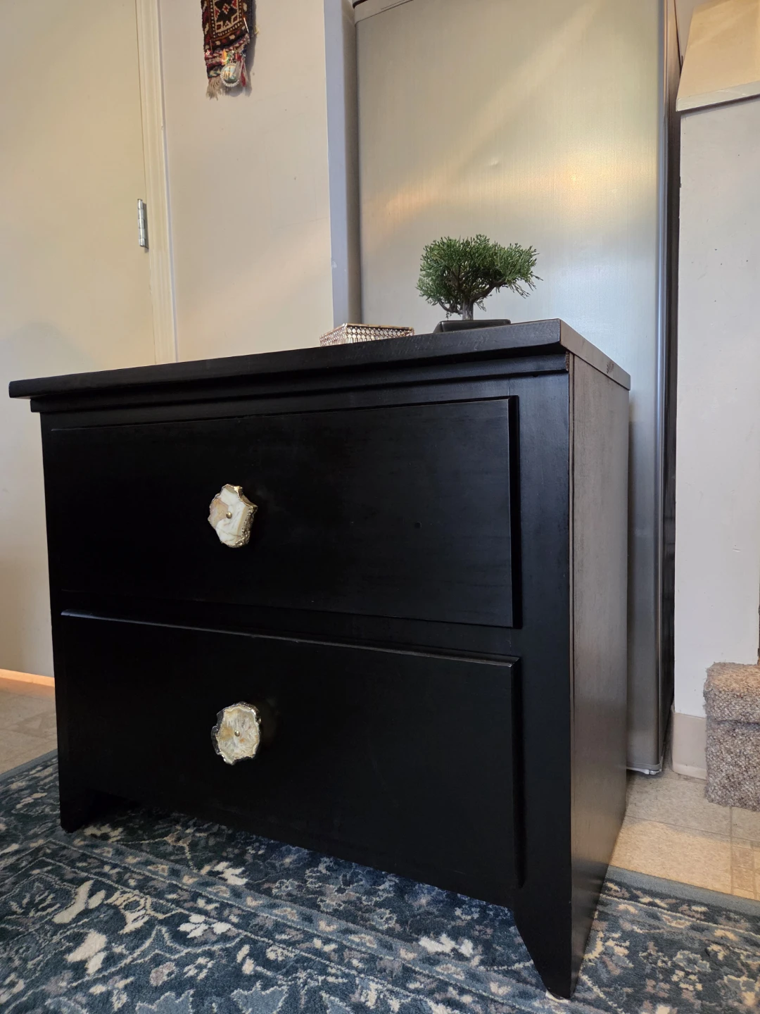 Black Two-Drawer Nightstands with Unique Stone Pulls