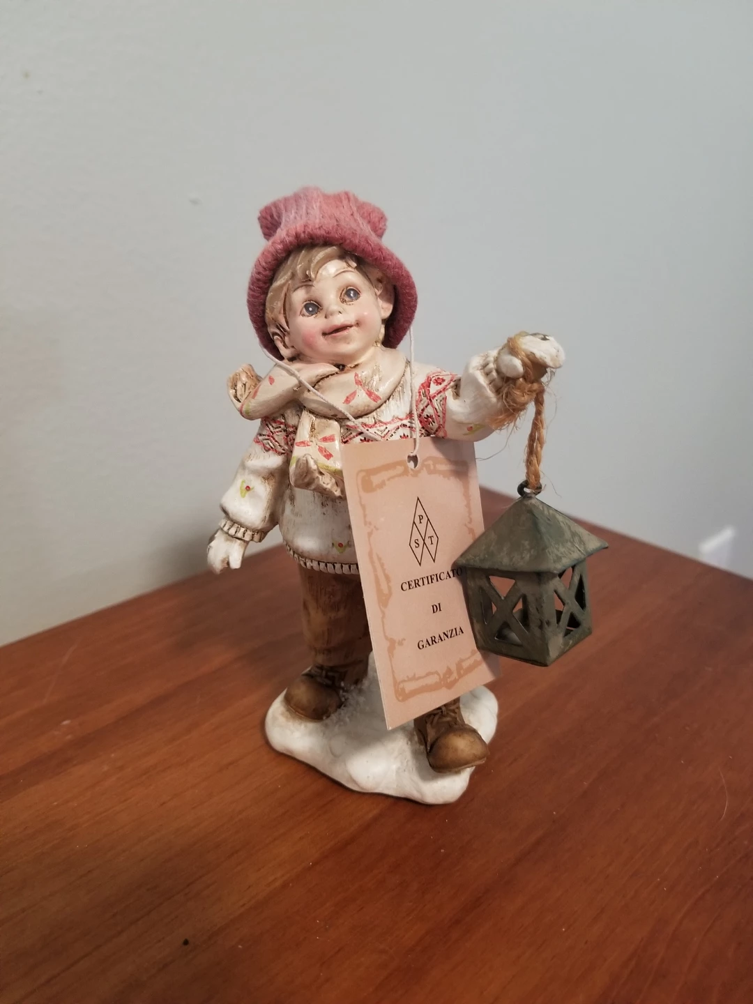Collectible Figurine of a Boy with Lantern