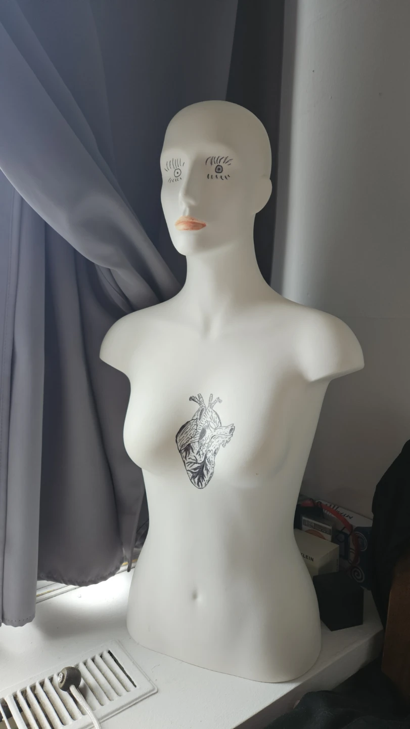White Mannequin Torso with Heart Tattoo Art