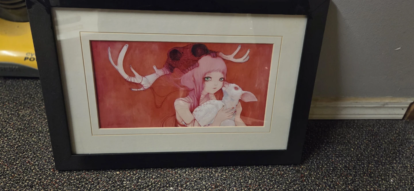Framed Artwork with Girl and White Creature