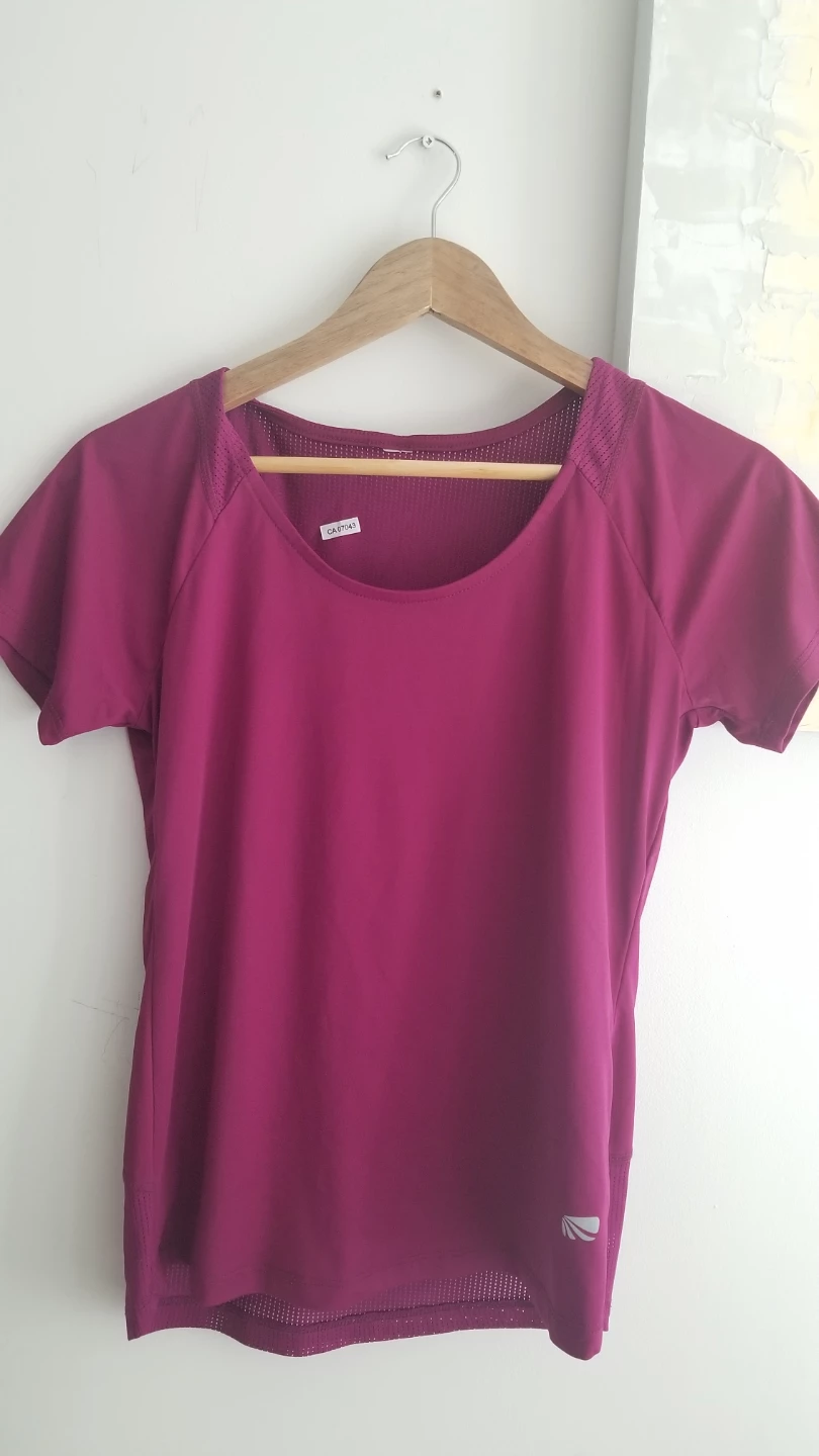 Shirt with mesh panelling at back
