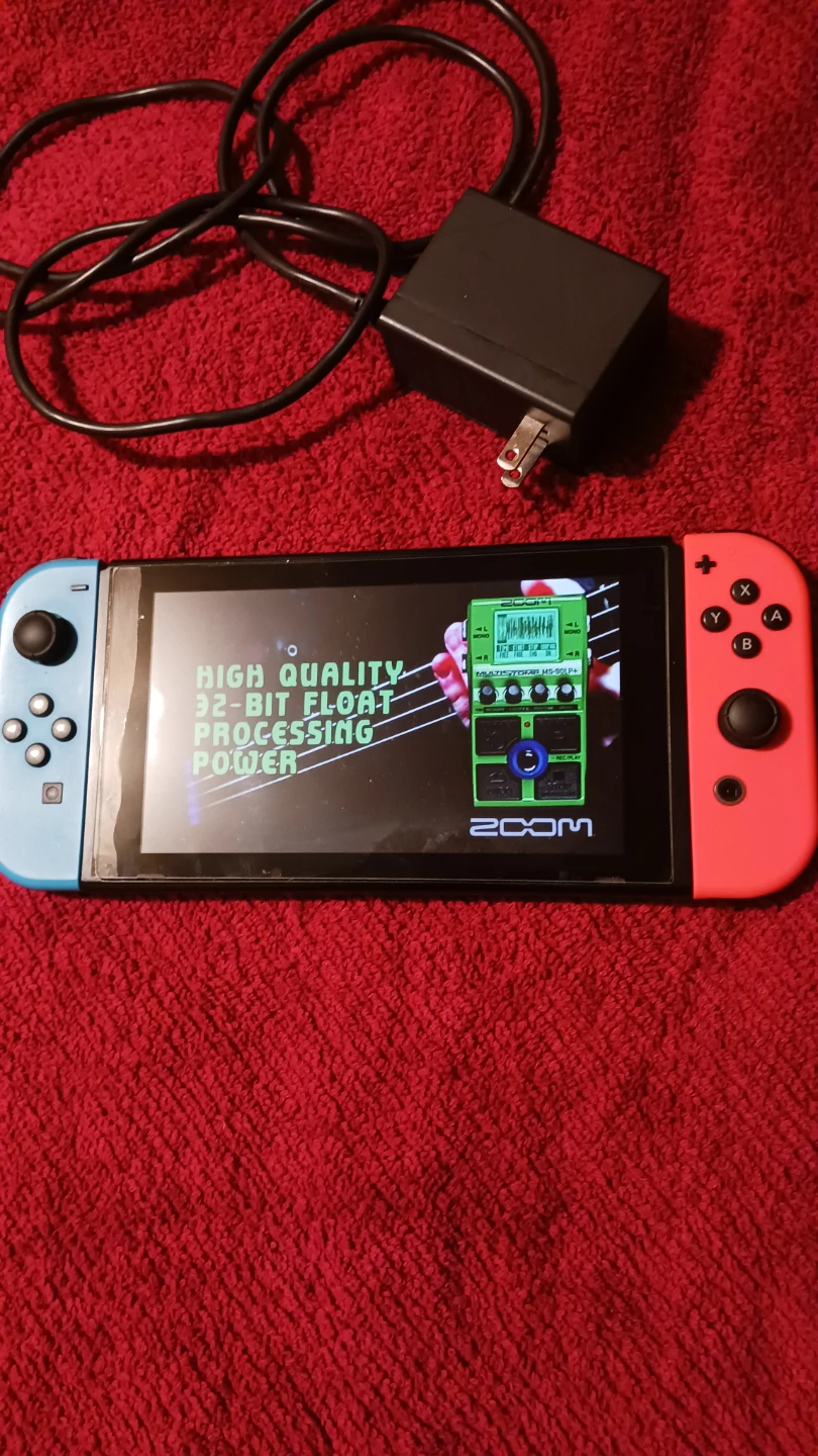 Nintendo Switch Console with Blue and Red Joy-Cons